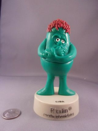 Ritalin Two - Faced Advertising Figure Dr.  