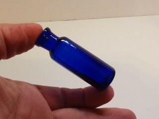 Tiny Antique Cobalt Blue 8 Sided Cork Top Medicine Bottle.
