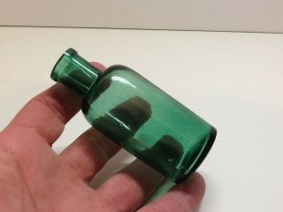 Small Antique Emerald Green Cork Top Medicine Bottle.