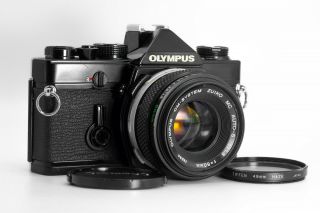 Olympus Om - 1 35mm Slr With 50mm F1.  8 Lens,  Cap,  Great,  Rare In Black.