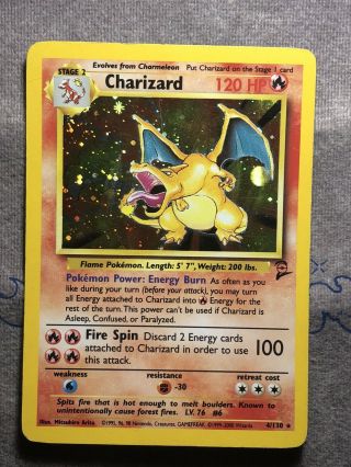 Charizard 4/130 Base Set 2 Rare Holo Pokemon Card Top Left Swirl Foil