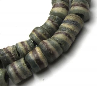 12 " Strand Of 44 Rare Well Worn Small Striped Ghana Sand Cast Glass Beads