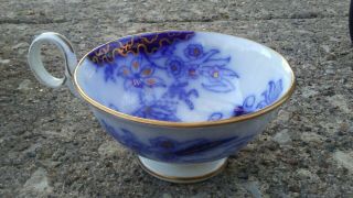Antique Flow Blue With Gold Colored Trim Cup.