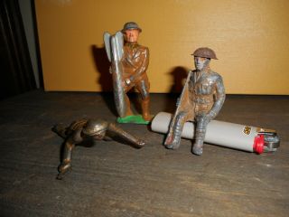 3 Rare Antique Metal Toy Military Soldiers; Sitting,  Crawling,  Holding Bomb