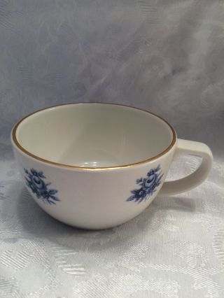 Royal Doulton English Fine China Tea Cup.  White With Blue Flowers And Gold Trim
