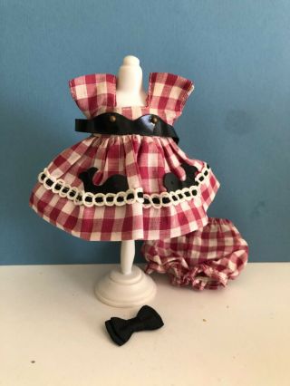A Vintage Vogue Ginny Doll Dress With A 1954 Medford Tagged Dress
