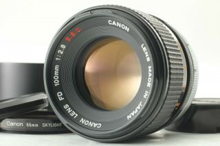 Rare " O " [near Mint] Canon Fd 100mm F/ 2.  8 S.  S.  C.  Lens W/ Hood From Japan 465