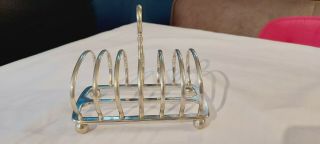 An Antique Silver Plated Toast Rack By William Hutton & Sons.  Sheffield.  1920.  S.
