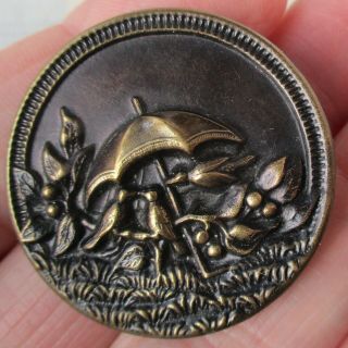 1 3/8 " Antique 2 - Piece Stamped Brass Button W Birds Under Umbrella Image