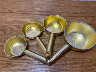 Rare Vintage Set Of Gold - Tone Aluminum Nested Measuring Cups