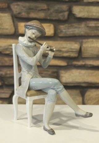 Lladro Porcelain Figurine Boy Playing The Flute Sitting In A Chair 4877 Rare