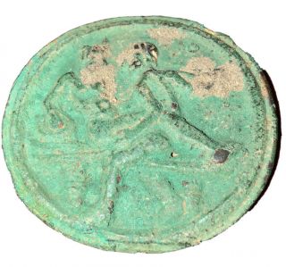An Antique Or Ancient Circular Bronze Amulet Depicting An Erotic (?) Scene