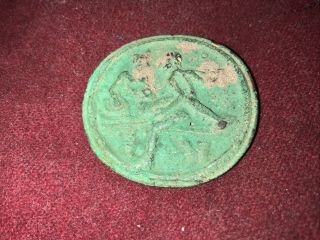 An antique or Ancient Circular Bronze Amulet Depicting an Erotic (?) Scene 2