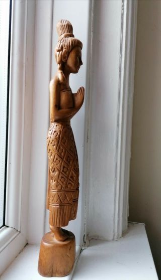 Antique wooden statue of a Thai lady. 3