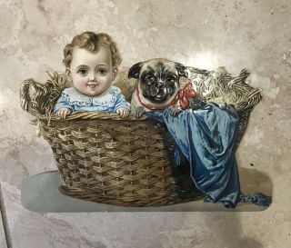 Antique Die Cut Adorable Child And Pug In A Basket
