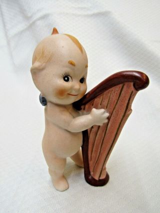 Vintage Bisque Kewpie Doll With Blue Wings Playing A Harp Numbered On Bottom Gc