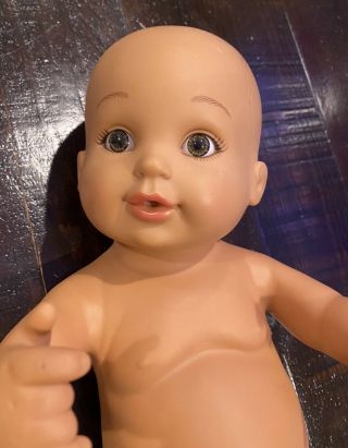 2010 Lauer Toys Inc.  Water Baby Doll,  Drinks Wet,  15” Brown Eyes