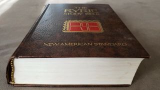 The Ryrie Study Bible Testament - 1978.  Hard cover is backwards - very rare. 3