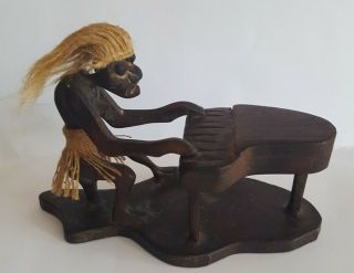 Vintage Hand Carved Tribal Tiki Man Playing Piano Wood African Art Carvings
