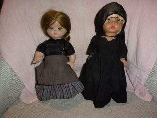 (2) 10 " Vintage Hard Plastic Dolls 1 W/ Googly Eyes & 1 Nun Doll