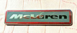 F1 McLAREN Badge.  Very Rare.  Size 60mm x 14mm.  Laminated Metal Badge. 2