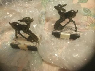 Rare French Art Deco Patinated Metal Sculptures Of Fawns On Marble Bases