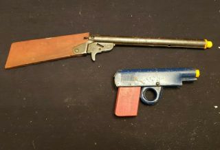 2 Antique / Vintage Pressed Metal & Wood Play Guns Model " M " & Daisy
