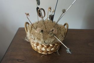 ANTIQUE BASKET STYLE PIN CUSHION WITH A VARIETY OF HAT PINS 3