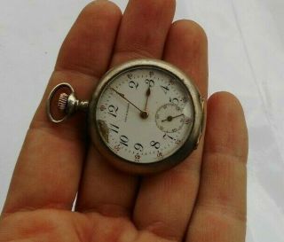 Vintage Antique 1.  25 " Sterling Silver Wind Up Pocket Watch Geo E.  Homer Tavannes