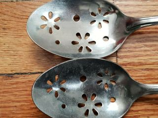 2 ANTIQUE VINTAGE COLLECTABLE EKCO STAINLESS STEEL SERVING SPOONS 7.  75 