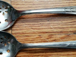 2 ANTIQUE VINTAGE COLLECTABLE EKCO STAINLESS STEEL SERVING SPOONS 7.  75 