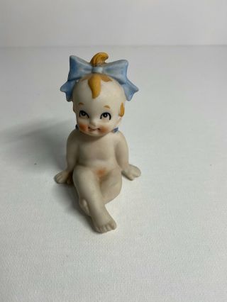 Vintage Ceramic Mini Kewpie Baby Figurine With Blue Bow