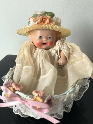 Antique/vintage 4 1/2” Porcelain Baby Doll Marked Germany In Tiny Bassinet