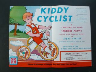 Vtg Rare 1948 Dealer Ad - Unigue Art Mfg Kiddy Cyclist Tin Litho Mechanical Toy
