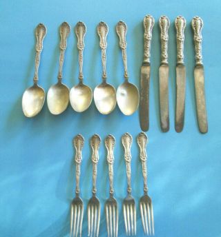 Antique Rogers Bro.  Silverplate 4 Knives,  5 Spoons A1,  5 Forks Xll With Star