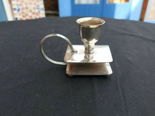 A Vintage Silver Plated Candle Holder And Match Box Holder.  Very Ornate.