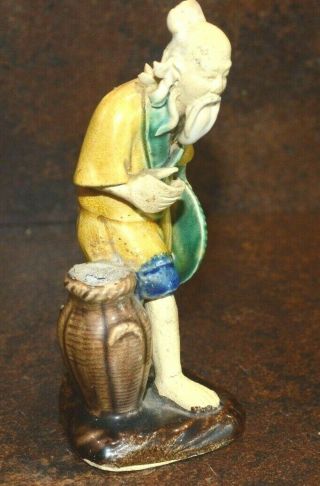 Porcelain figure of a Chinese man 13 cm tall 3
