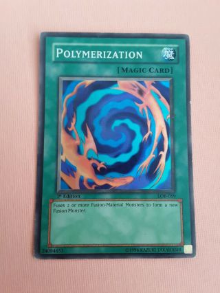 Yugioh Polymerization Lob - 059 Rare 1st Edition Legend Of Blue Eyes Lp