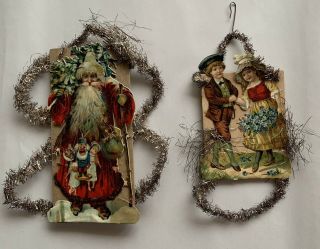 2 Antique Christmas Victorian Die Cut Scrap & Tinsel Santa & Couple Ornaments