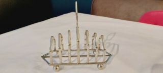 An Antique Silver Plated Toast Rack By Daniel And Arter.  Late 1800.  S.  Very Ornate