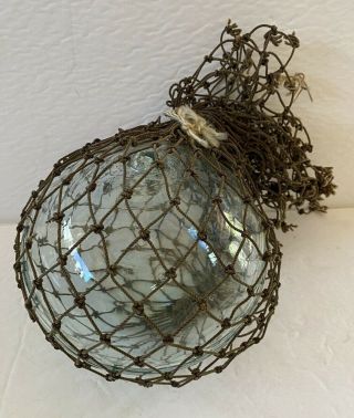 Antique Pale Blue Glass Fishing Float With Old Rope Netting