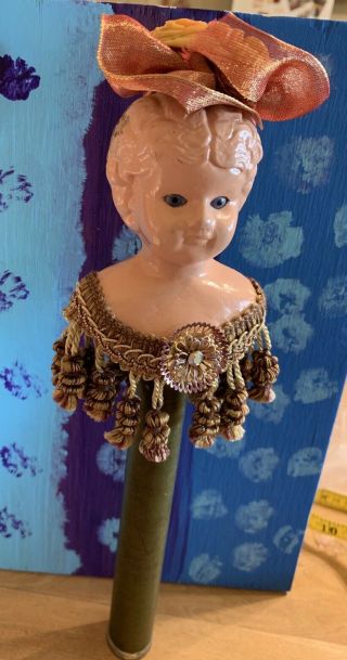 Antique Tin Doll Head Repurposed Into A Decorative Item