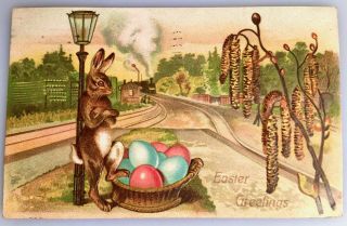 Antique 1909 Postcard Easter Humanized Rabbit Waiting At Train Station Embossed