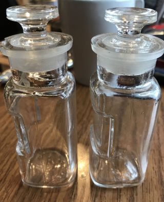 2 VINTAGE ANTIQUE W.  T.  CO APOTHECARY BOTTLES WITH GLASS STOPPER 2