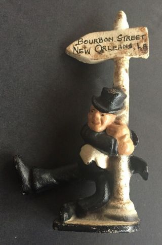 Antique Cast Iron Drunk Man Holding On Bourbon St Orleans Sign Bottle Opener