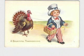 Antique Postcard Thanksgiving Little Boy Uncle Sam Turkey Basket Of Apples Bount