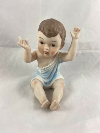 Vintage Sitting Piano Baby Boy Figurine 4 1/2” Inch Tall Hand Painted Bisque