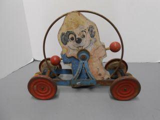 Vintage Gong Bell Mfg Dog Clown Pull Toy Collector.  Rare