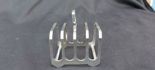 An Antique Silver Plated Toast Rack By Elkington.  1920.  S.  Very Ornate.