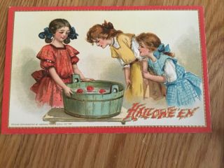 Antique Tuck’s Hallowe’en Postcard,  Unposted,  No.  174 Girls Bobbing Apples